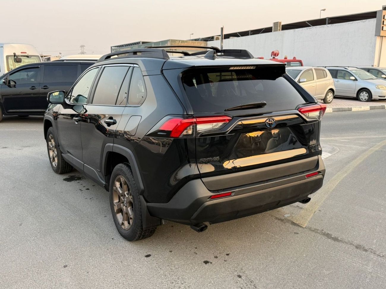 تويوتا راف ٤ 2023 TOYOTA RAV4 WOOD LAND EDITION HYBRID AWD IMPORTED FROM USA