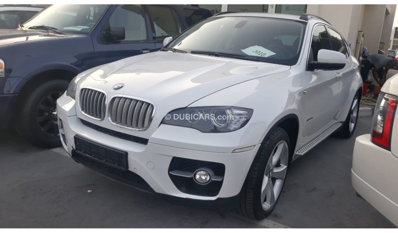 BMW X6 2010 Gulf specs  5.0 Ltr twin turbo full options 3 DVD