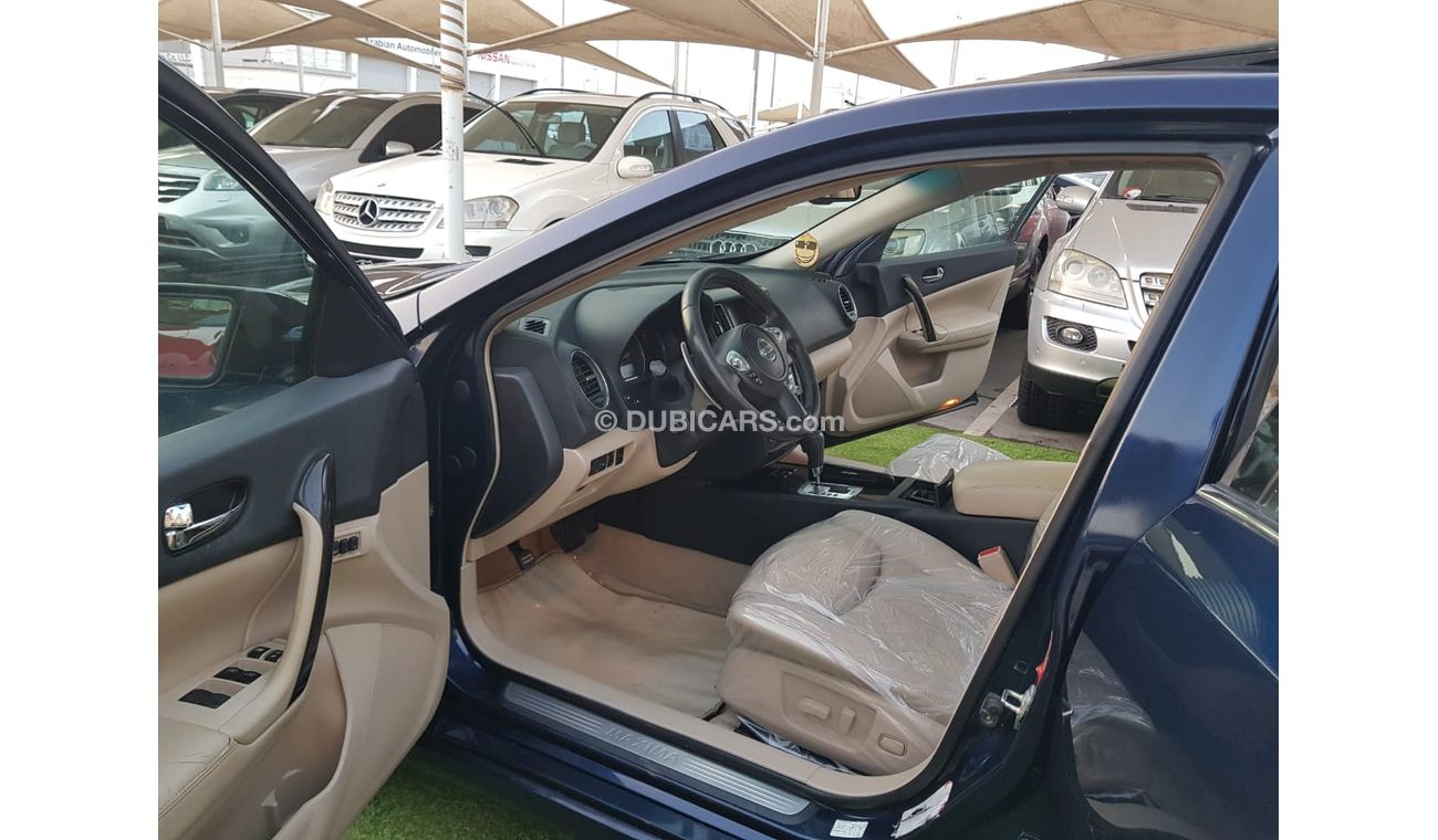 Nissan Maxima GCC Number One - Full Option - sunroof - Leather - Back Wing - Screen - Sensors -Excellent condition