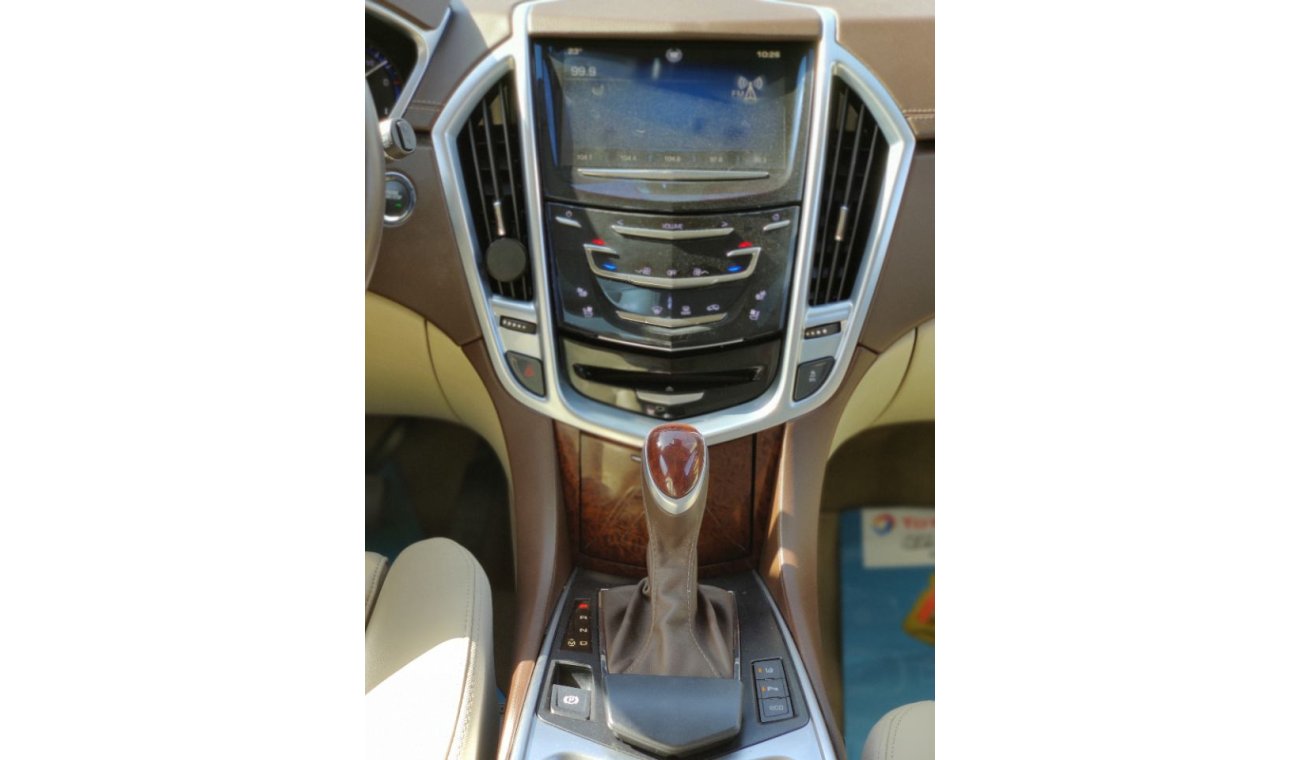 كاديلاك SRX 2014 model GCC specs full options panorama clean car 3.6ltr