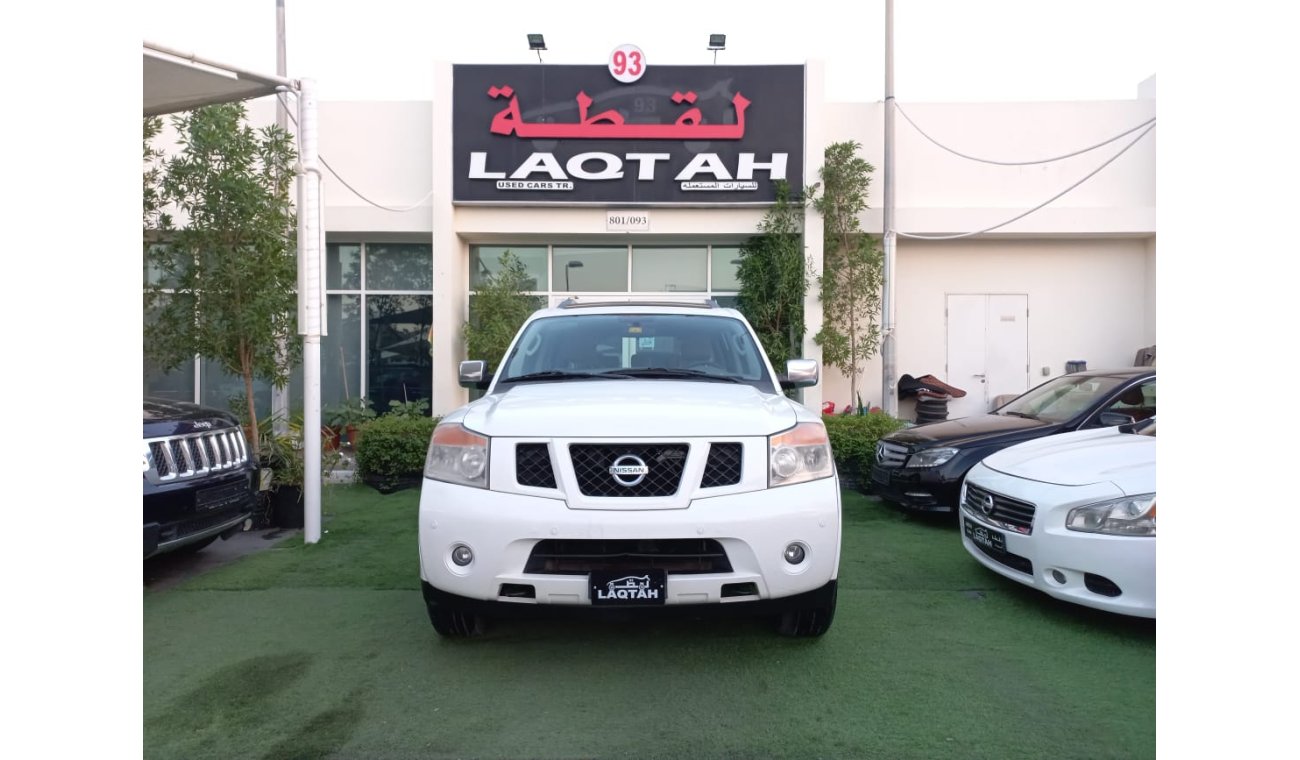 Nissan Armada Gulf model 2009  SE paint agency number one slot control unit in excellent condition