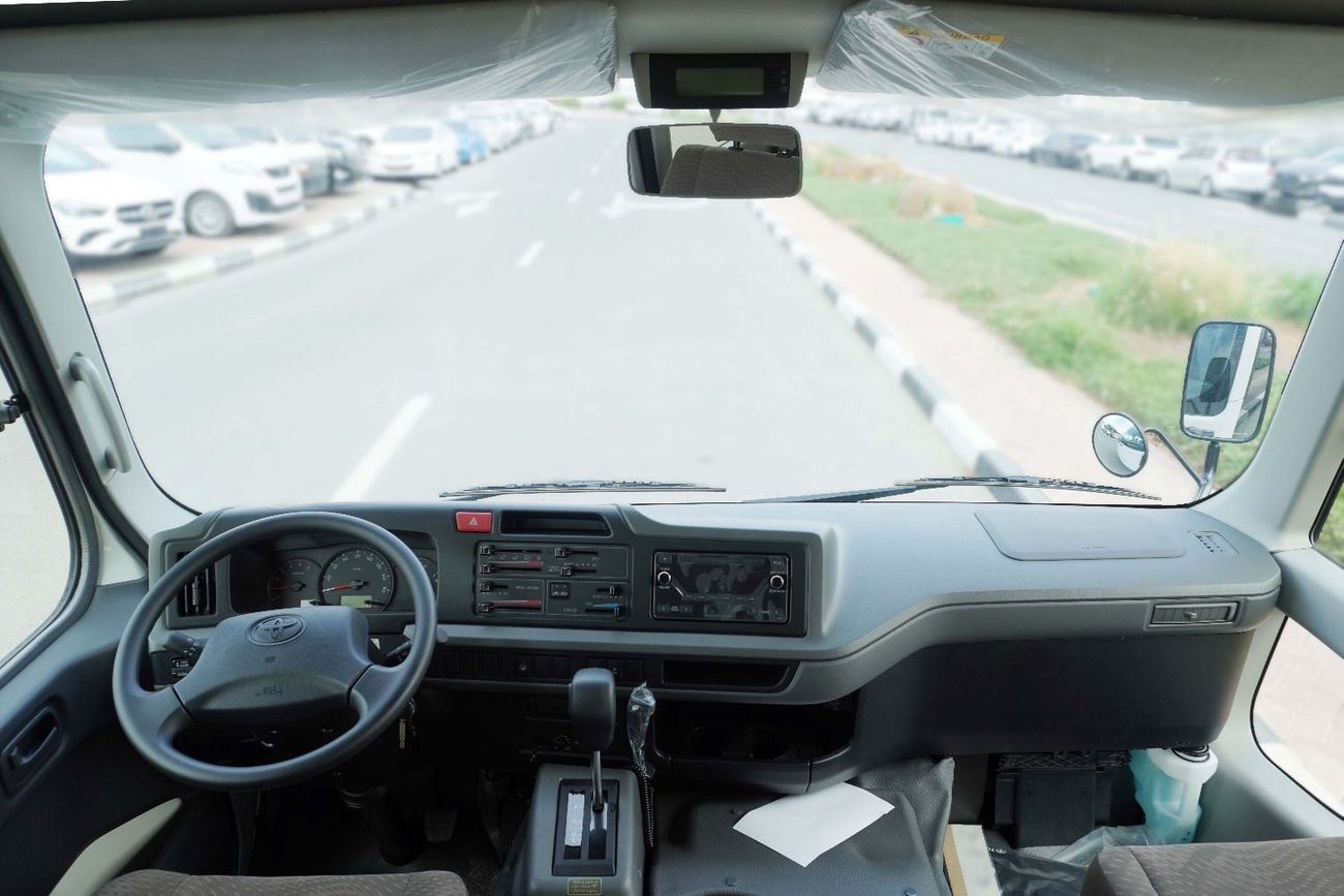 Toyota Coaster 2025 MODEL TOYOTA-COASTER 2.8L TD A/T (22 STR, WITH REFRIGERATOR AND HIGH BACK SEATS)