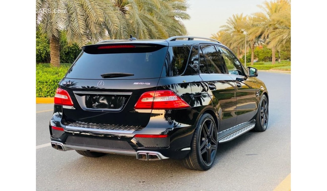 مرسيدس بنز ML 63 AMG Std مرسيدس بنز ML63 خليجي فل ابشن كاريون فايبر بحاله ممتازه