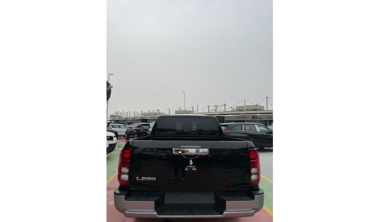 ميتسوبيشي L200 SPORTERO 20204 FULL OPTION DIESEL