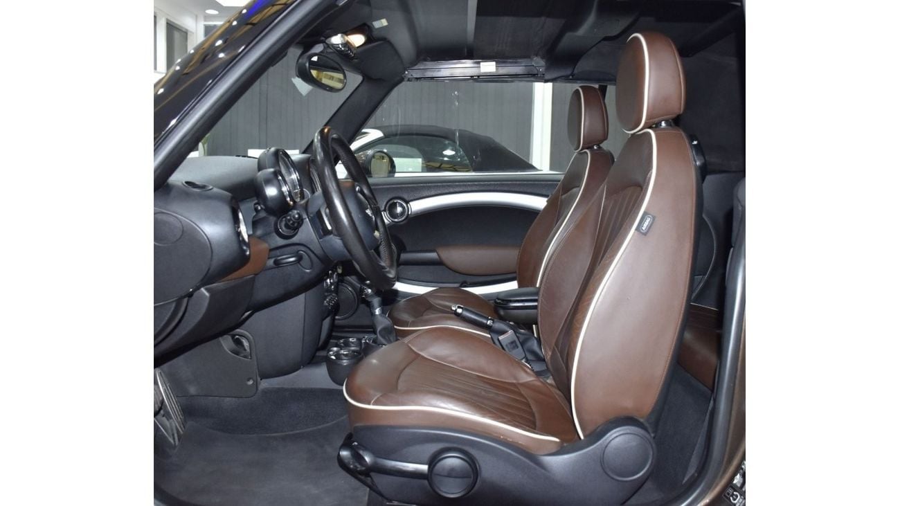Mini Cooper S EXCELLENT DEAL for our Mini Cooper S Convertible ( 2011 Model ) in Brown Color GCC Specs