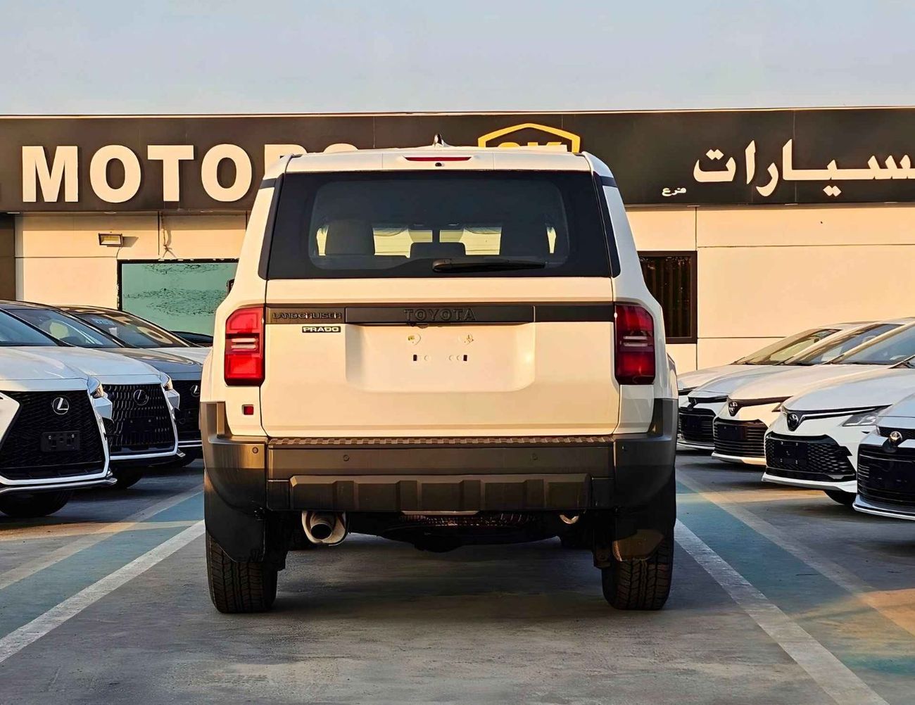 تويوتا برادو LC250 URBAN / 2.4L PETROL 4WD / DVD+CAMERA / COOL BOX / FABRIC SEATS (CODE # PR24U)