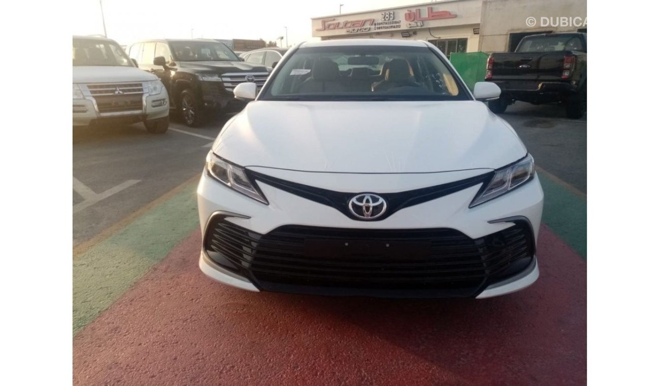 Toyota Camry LE 2022  White inside beige 2.5L petrol 4 Cylinder