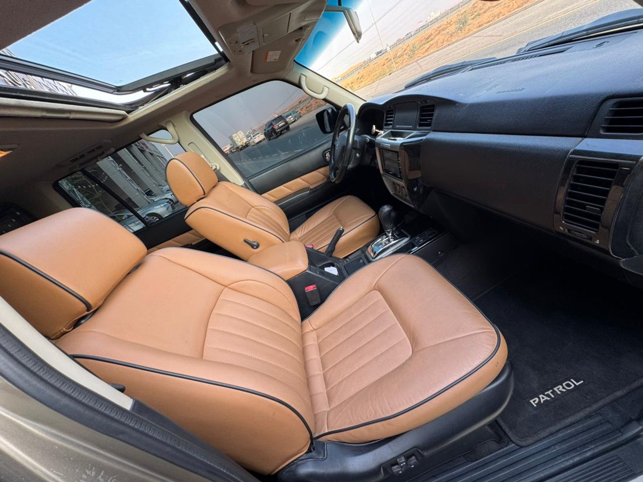 نيسان باترول سوبر سفاري سوبر سفاري / محرك VTC 4.8 لتر V6 / كامل المواصفات / فتحة سقف / قفل تفاضلي / مقاعد جلدية / بحالة ممتا