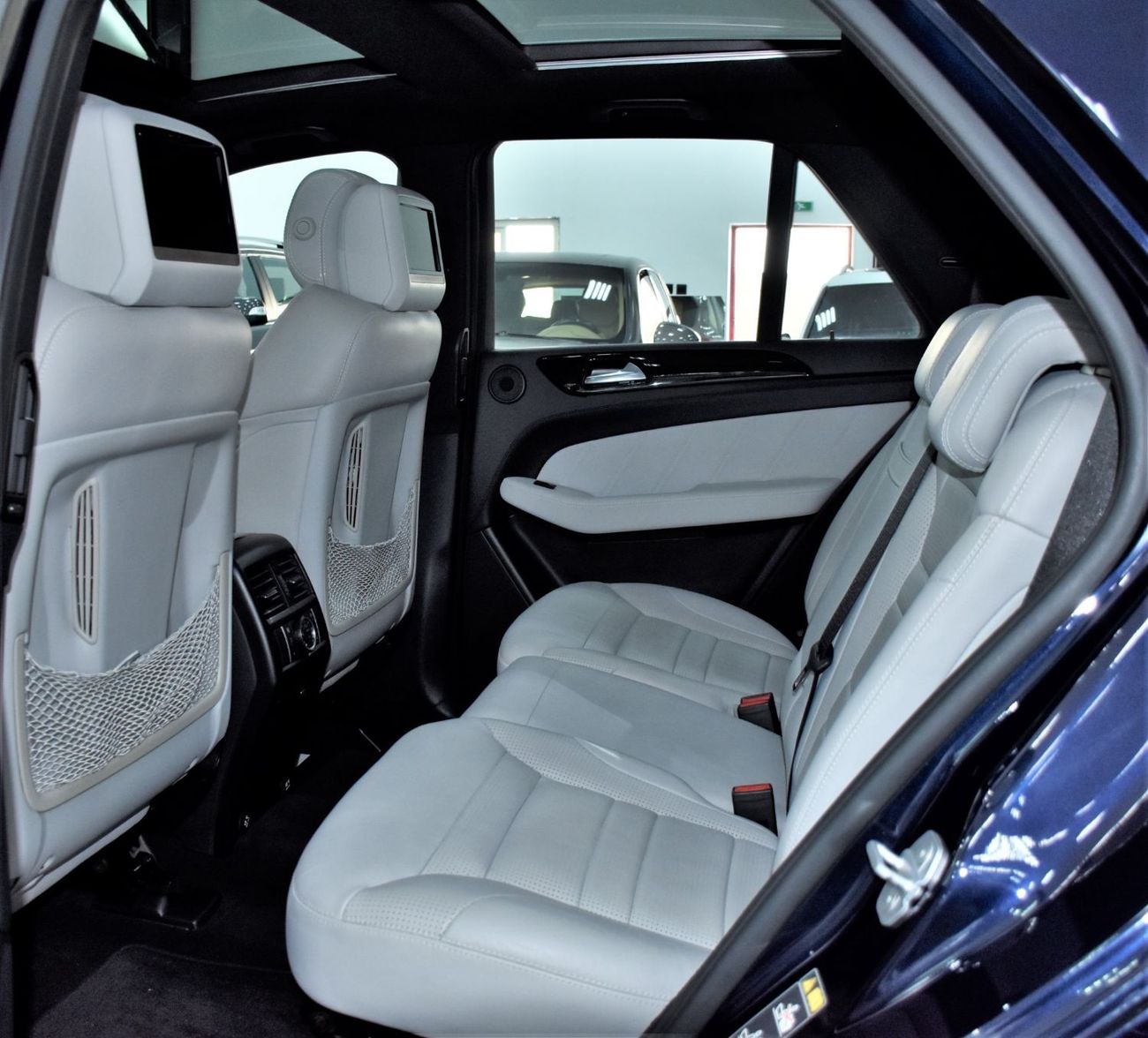 Mercedes-Benz ML 63 AMG EXCELLENT DEAL for our Mercedes Benz ML63 AMG ( 2013 Model ) in Dark Blue Color GCC Specs