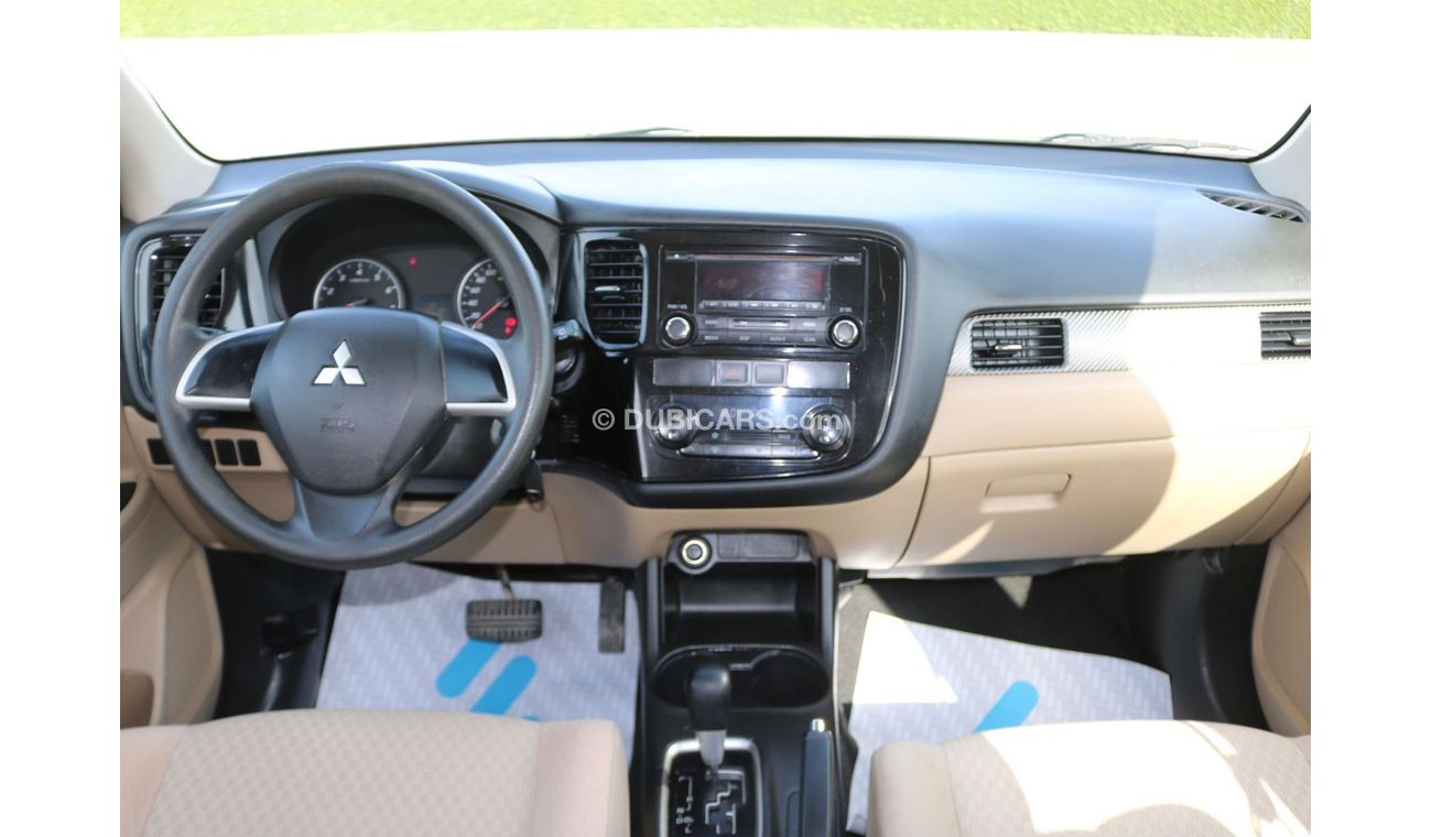 ميتسوبيشي آوتلاندر 2014 | MITSUBISHI OUTLANDER - 7 SEATER CAPACITY PETROL A/T WITH GCC SPECS AND EXCELLENT CONDITION