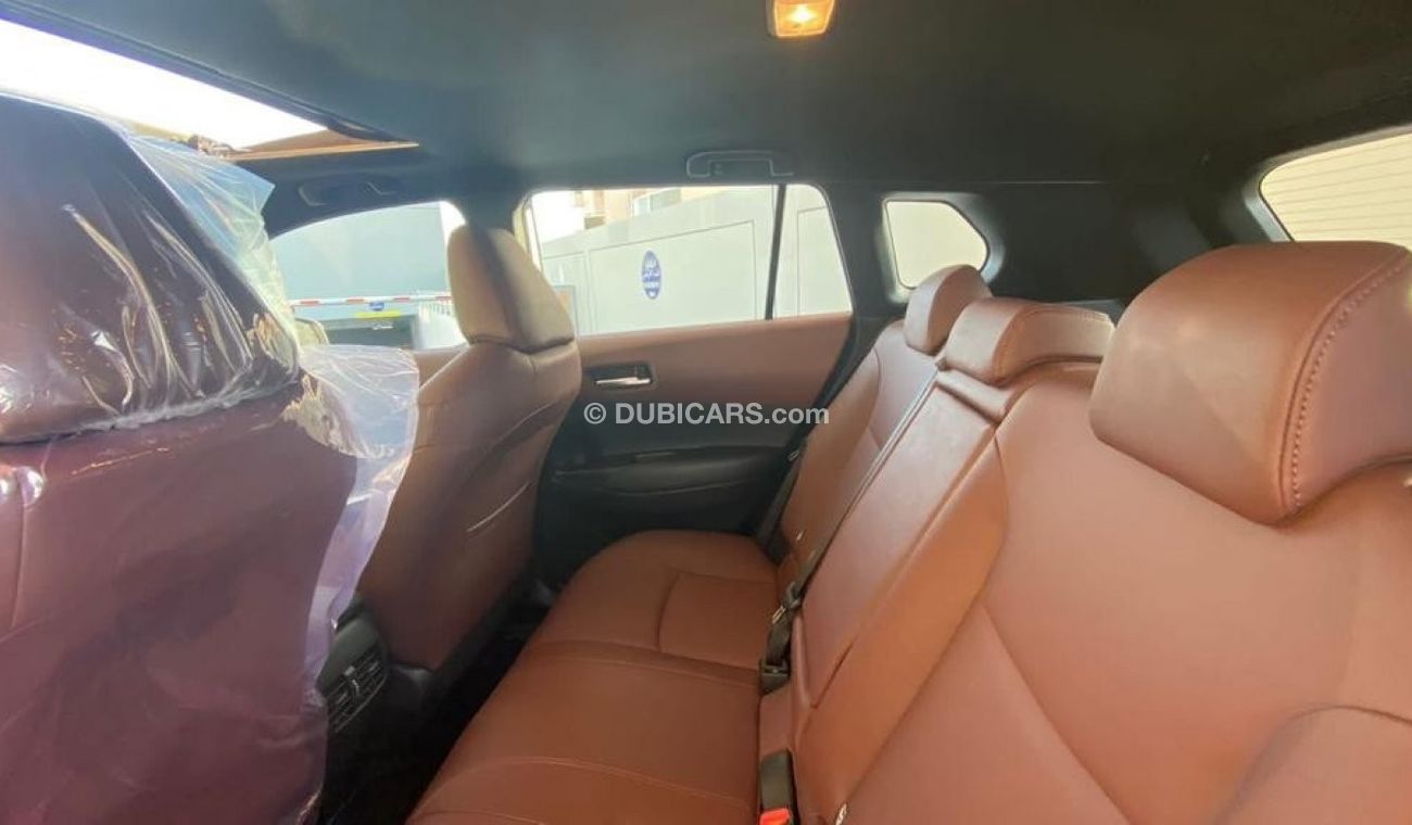 Toyota Corolla Cross Full option 2023 Limited Hybrid FWD 1.8L petrol only  For UAE. Ready for Delivery
