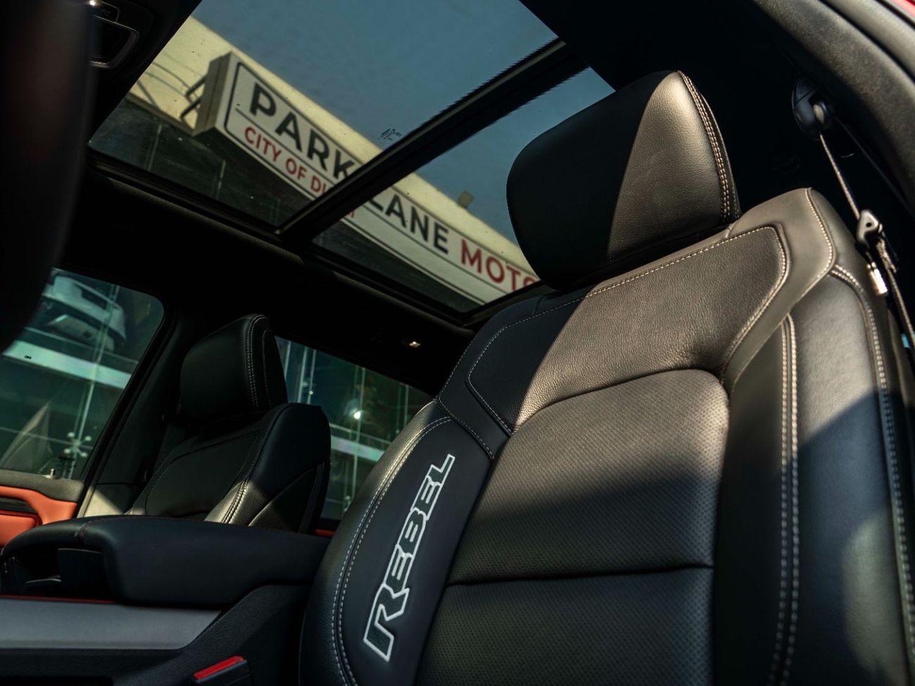 RAM 1500 AED 3,460 PM • RAM 1500 REBEL LUXURY 5.7L HEMI® V8 • ONLY 13,000 KMS • DODGE WARRANTY + SERVICE PLAN