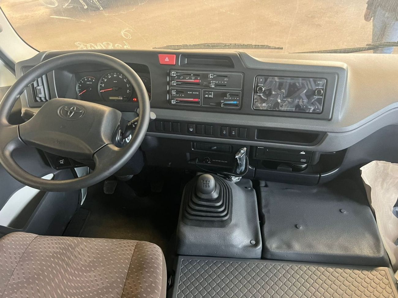 Toyota Coaster 2026 Toyota Coaster High-Roof 23-Seater 4.2L 6-Cyl Turbo Diesel M/T RWD (Auto Closing Door) Export O