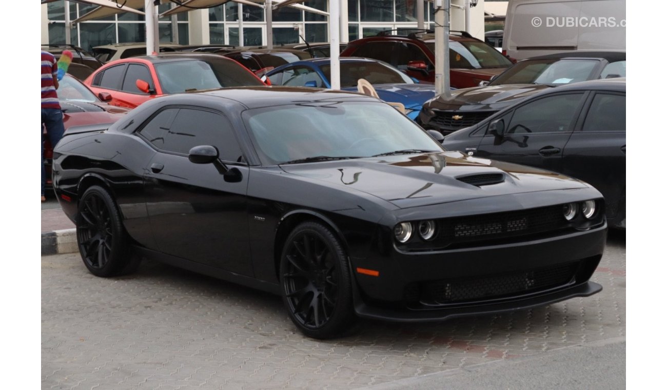 Dodge Challenger R/T make/ Dodge Challenger  model / 2017  color / black  engine size / 8 cylinder  5.7L  transmissio