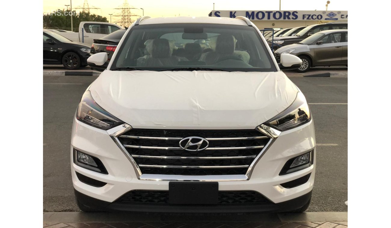 Hyundai Tucson 2.0L, Remote engine star, 18'' AW, Down Brake, Big DVD+Camera, Push Start, Wireless Charger