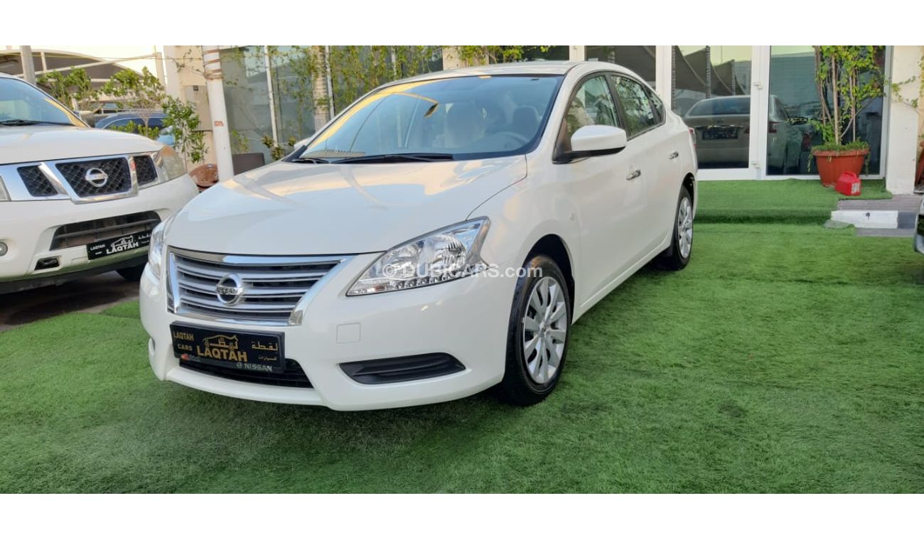 Nissan Sentra Gulf - agency condition - white paint inside beige in excellent condition, you do not need any expen