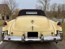 كاديلاك سيريس 62 1949 Cadillac Series 62 Convertible – Fiesta Ivory – Red Leather – Matching Numbers – Collector Grad