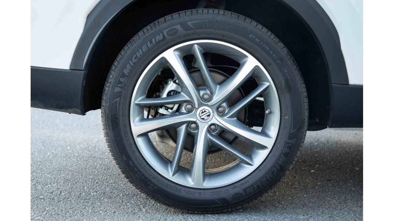 أم جي HS 2023 إم جي HS 4X4 2.0T LUXURY - أبيض لؤلؤي من الداخل بني | سعر التصدير