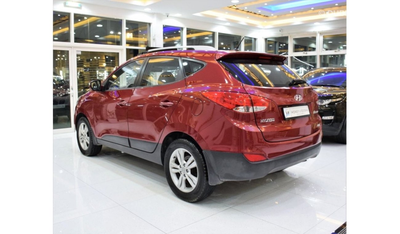 Hyundai Tucson GL EXCELLENT DEAL for our Hyundai Tucson 4WD ( 2012 Model! ) in Red Color! GCC Specs