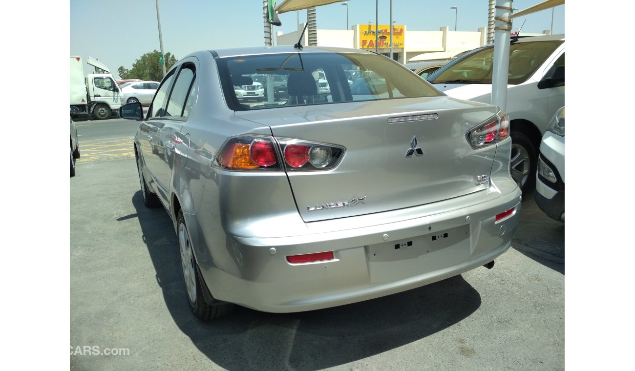 Mitsubishi Lancer 2016 SILVER GCC NO ACCIDENT NO PAIN PERFECT