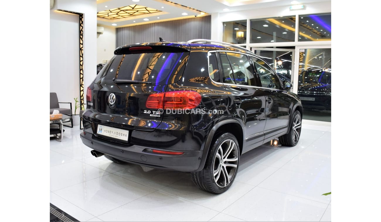 Volkswagen Tiguan SEL EXCELLENT DEAL for our Volkswagen Tiguan 2.0 TSi 4Motion ( 2014 Model! ) in Black Color! GCC Spe