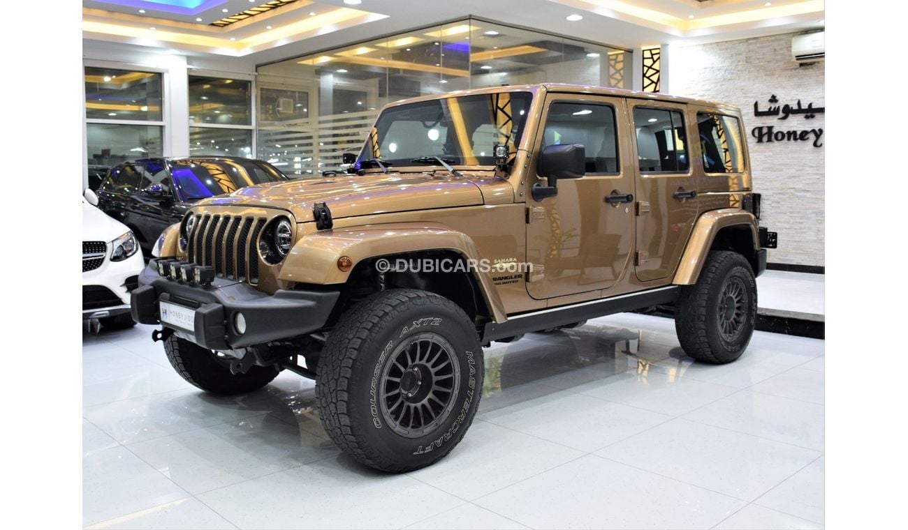 Jeep Wrangler Sahara EXCELLENT DEAL for our Jeep Wrangler UNLIMITED SAHARA 4x4 ( 2015 Model! ) in Brown Color! GCC