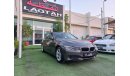 BMW 316i Model 2013 Gulf Brown BM316i color Cruise control, wheels control in excellent conditiona