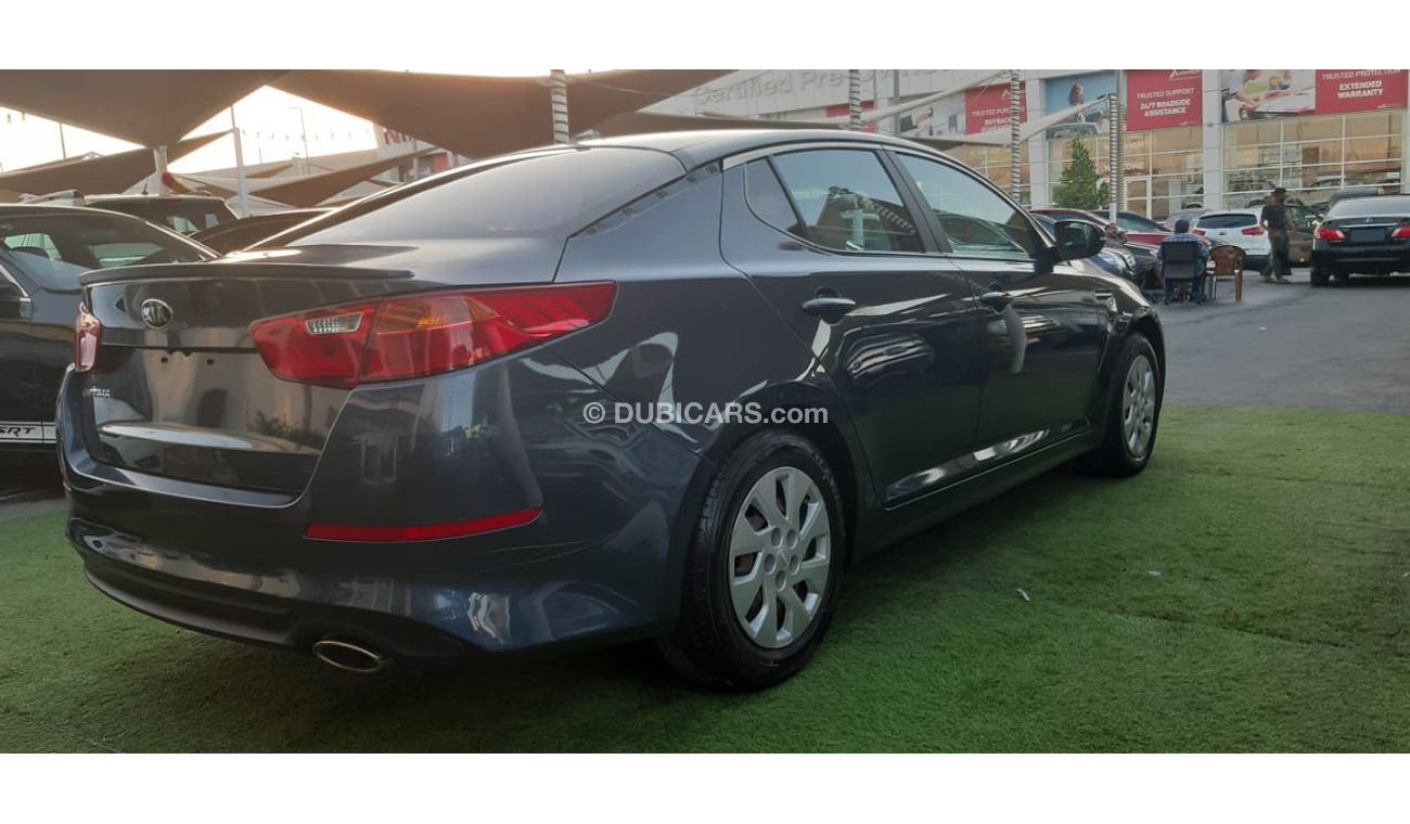 كيا أوبتيما خليجى رقم 2  شاشة   كاميرا  مثبت  سرعة  جناح خلفى رنجات حساسات أنوار ضباب بحالة ممتازة