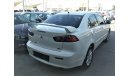 Mitsubishi Lancer 2015 WHITE GCC NO PAIN NO ACCIDENT PERFECT