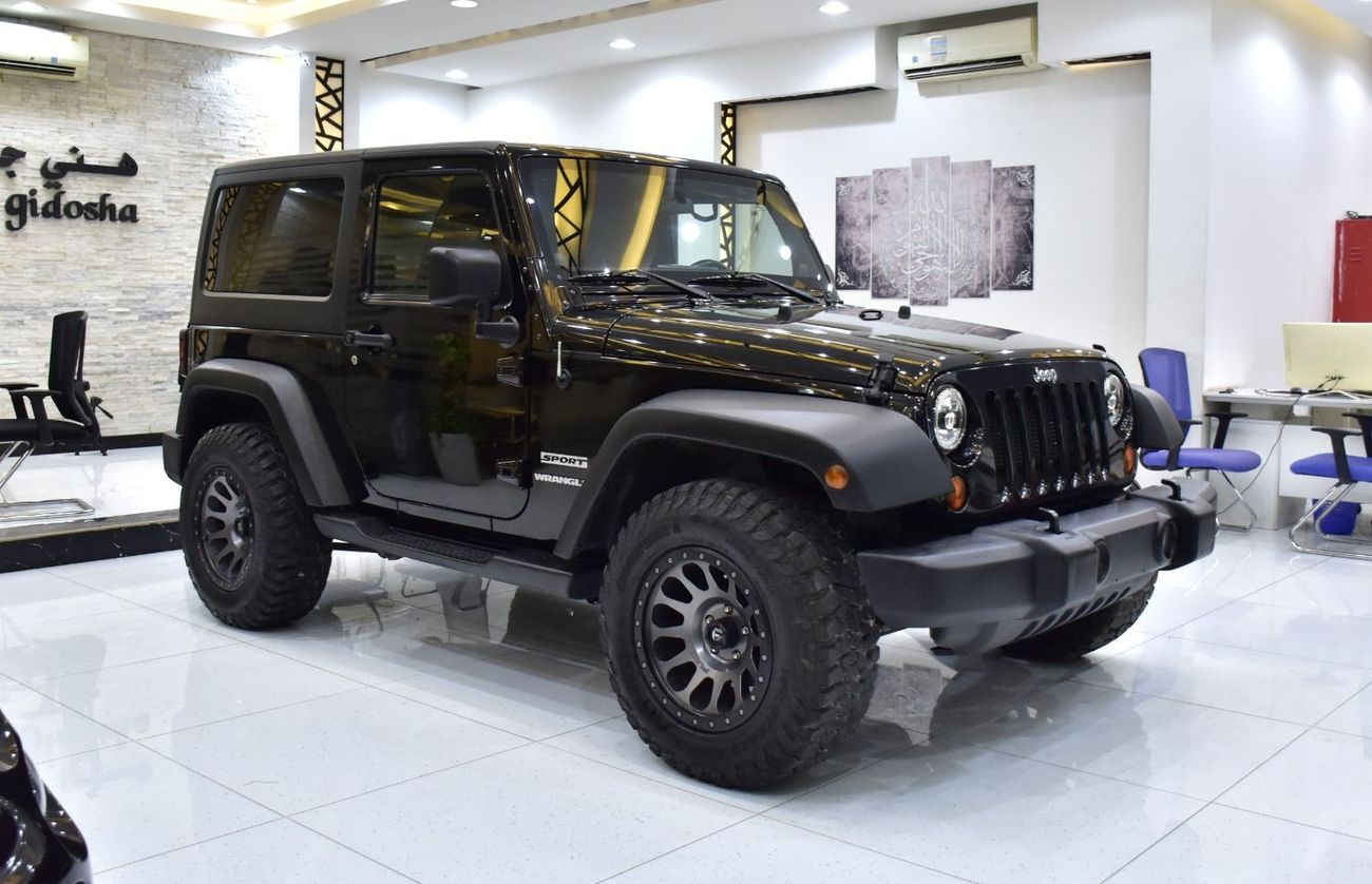 Jeep Wrangler EXCELLENT DEAL for our Jeep Wrangler Sport ( 2012 Model ) in Black Color American Specs