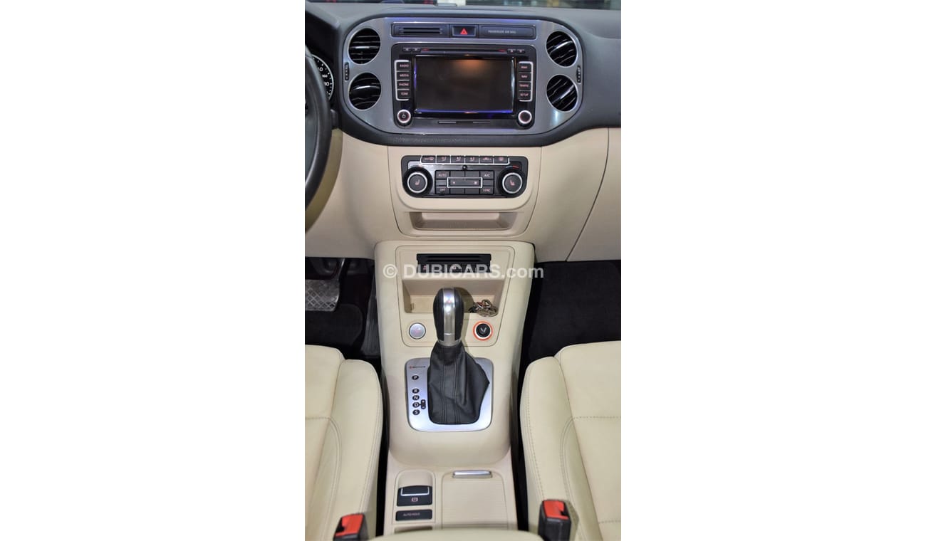 Volkswagen Tiguan SEL EXCELLENT DEAL for our Volkswagen Tiguan 2.0 TSi 4Motion ( 2014 Model! ) in Black Color! GCC Spe