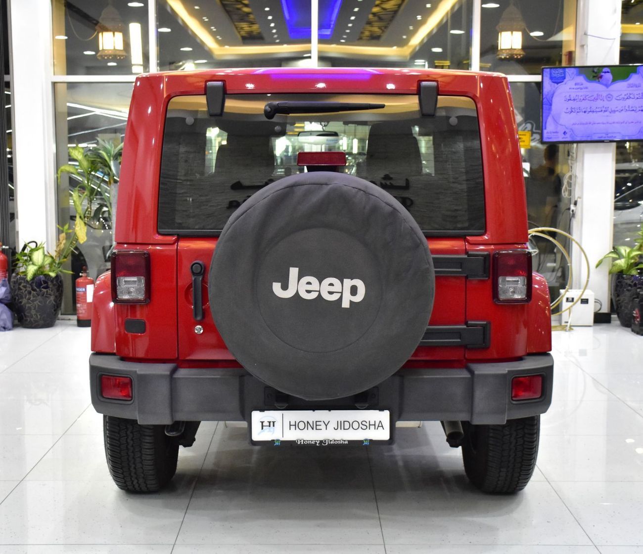 Jeep Wrangler EXCELLENT DEAL for our Jeep Wrangler Sahara ( 2014 Model ) in Red Color GCC Specs