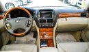 Lexus LS 430 Imported 1/2 Ultra, model 2006, white color, leather opening, wooden wheels, electric mirrors, excel
