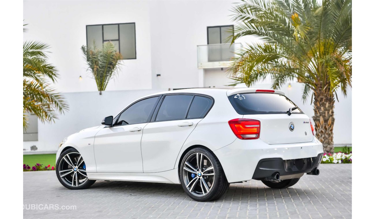 بي أم دبليو M135 With Aakraprovic Exhaust - Fully Agency Serviced - AED 1,639 Per Month - 0% DP