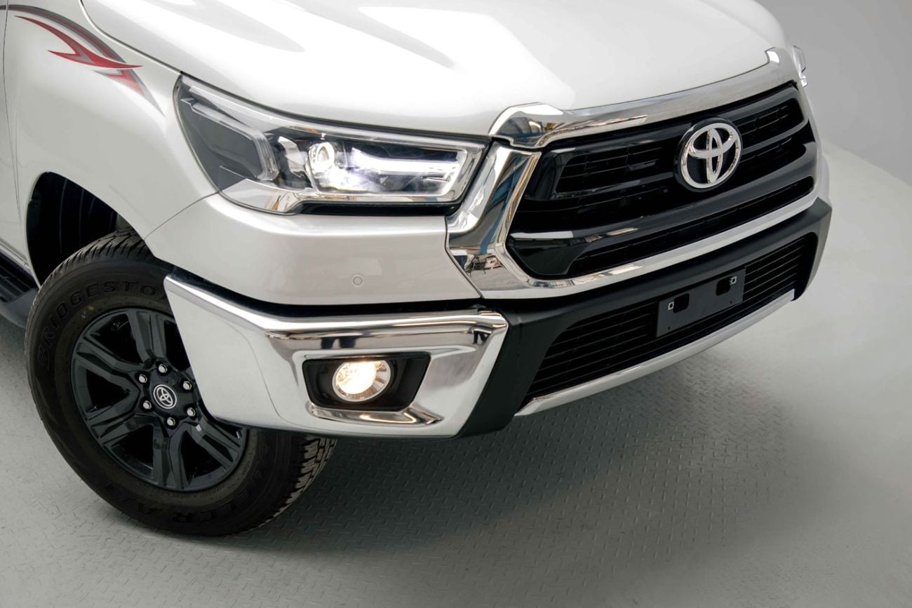 Toyota Hilux 2.4L - Platinum White Inside Maroon | Export Only