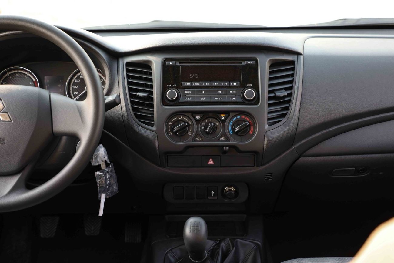 Mitsubishi L200 2023 Mitsubishi L200 DC 4x4 2.4 - White Solid inside Grey | Export Only