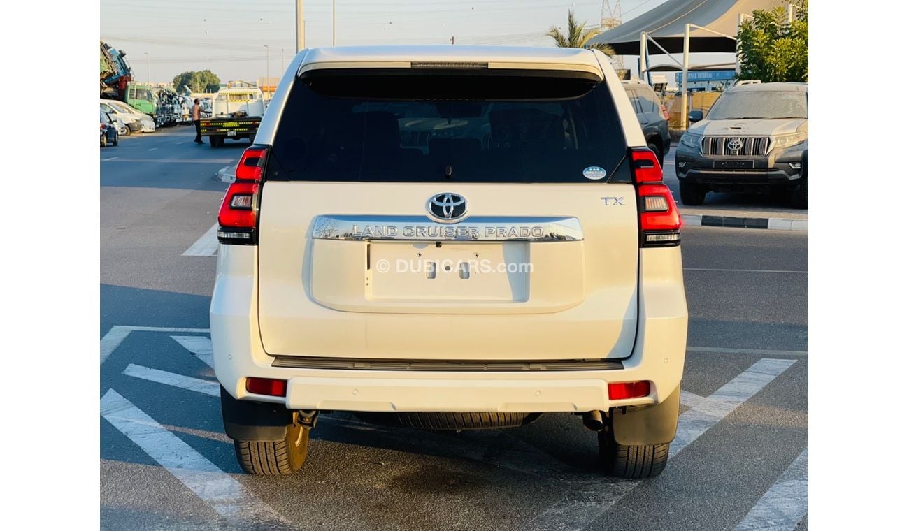 Toyota Prado Toyota prado Petrol  engine 2.7 model 2018 from japan white color 7 seater car very clean and good c