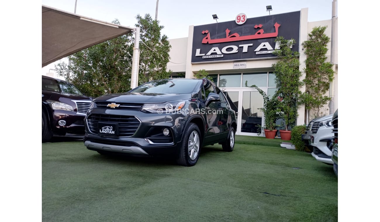 Chevrolet Trax 1400 CC 2021 model, gray color, cruise control, rear spoiler, screen, rear camera, in excellent cond