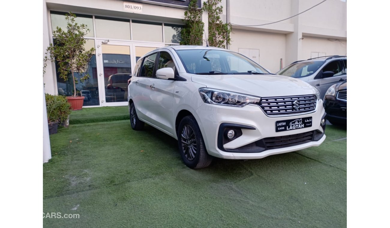 Suzuki Ertiga Gulf model 2019, agency dye, 1600 cc, imprint, white color, rear wing, alloy wheels, air conditionin