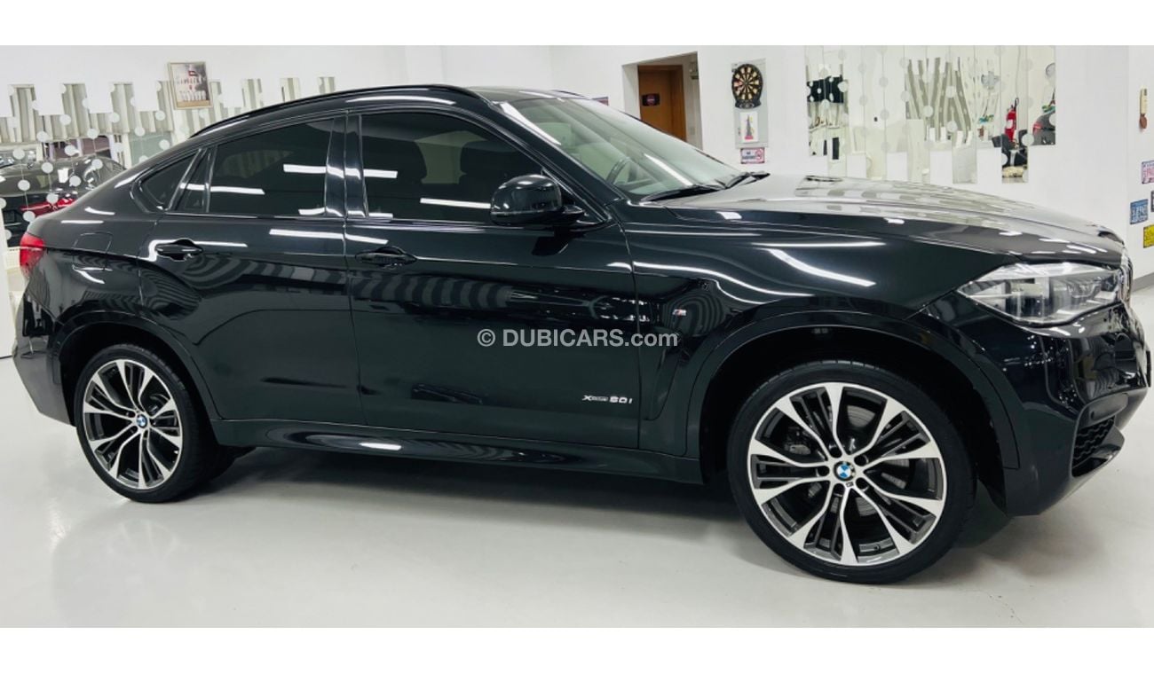 BMW X6 50i M Sport GCC .. FSH .. Perfect Condition .. Original Paint ..