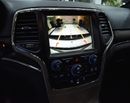 Jeep Grand Cherokee EXCELLENT DEAL for our Jeep Grand Cherokee Limited 4x4 ( 2015 Model ) in Silver Color GCC Specs