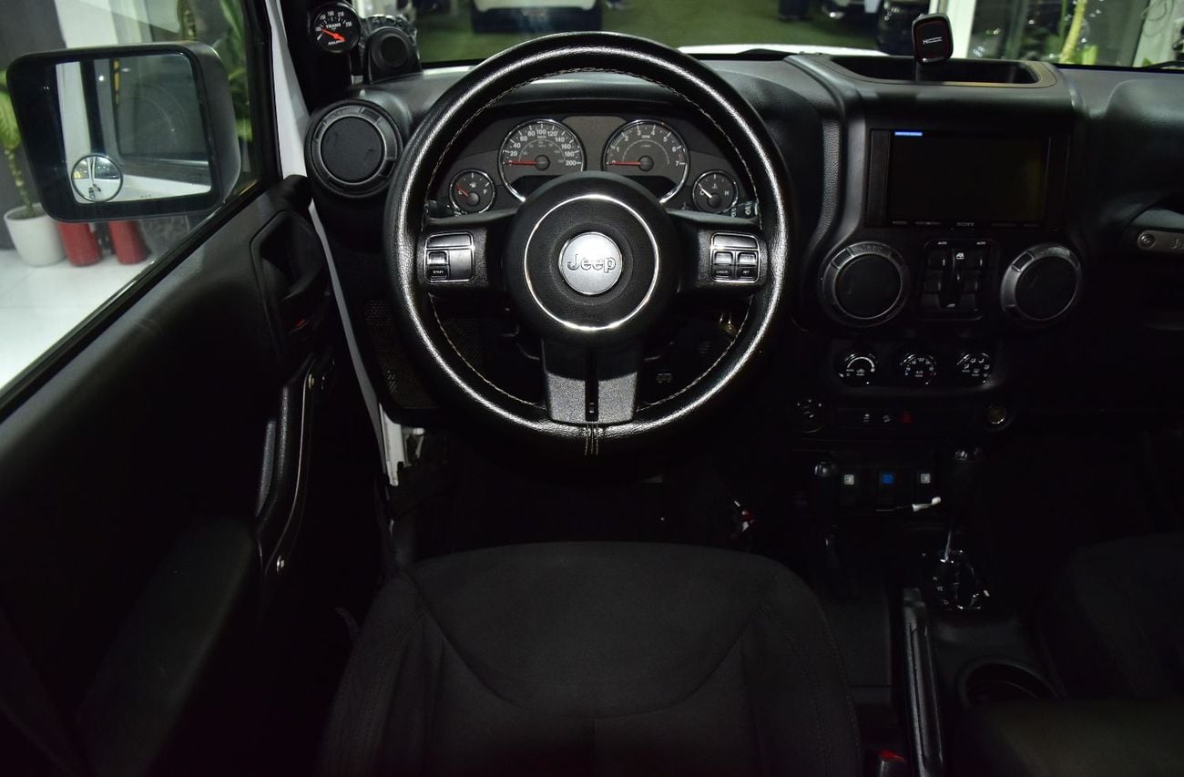 Jeep Wrangler EXCELLENT DEAL for our Jeep Wrangler Unlimited Sport ( 2014 Model ) in White Color GCC Specs