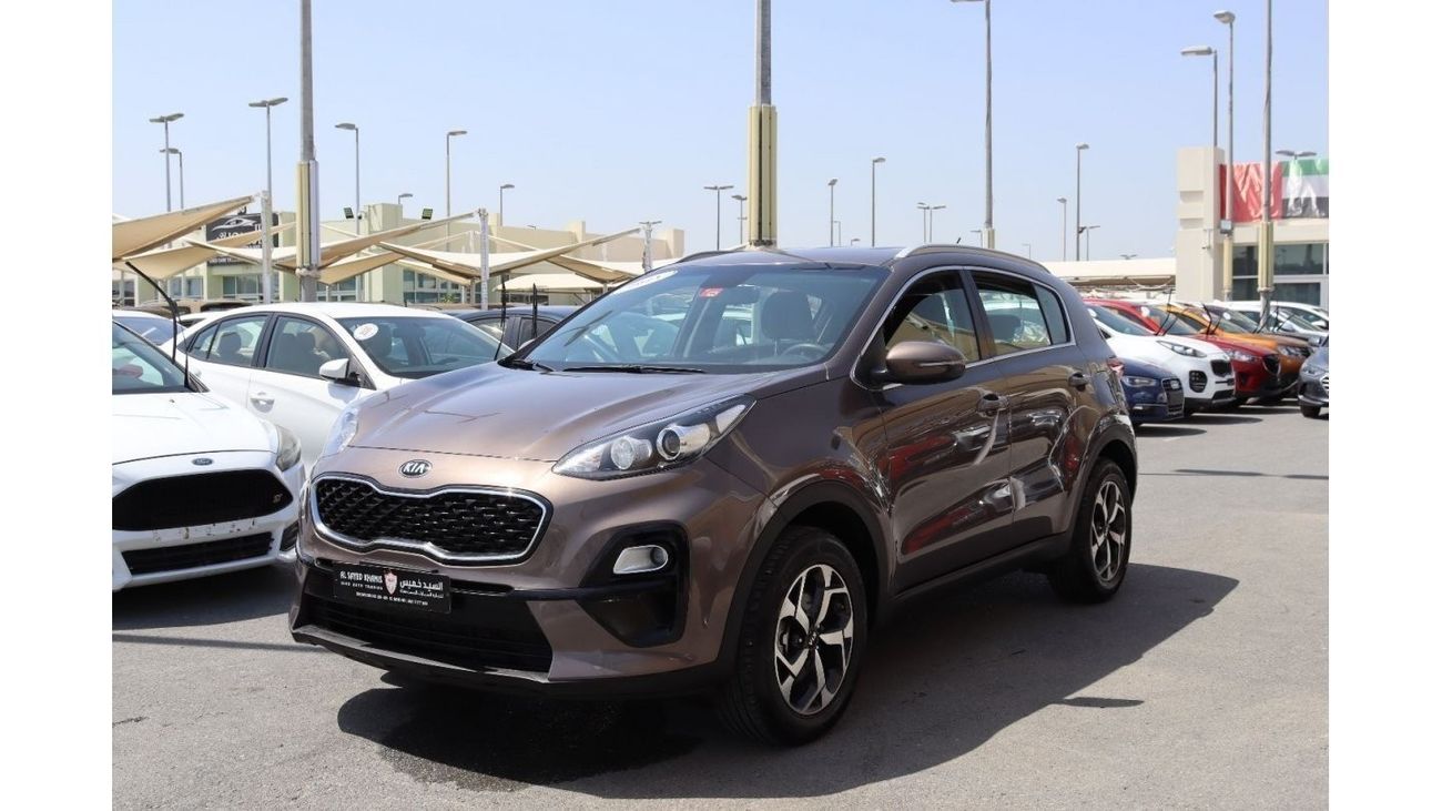 كيا سبورتيج EX خالية من الحوادث - خليجي - بحالة الوكالة - مكينة 1600 سي سي -