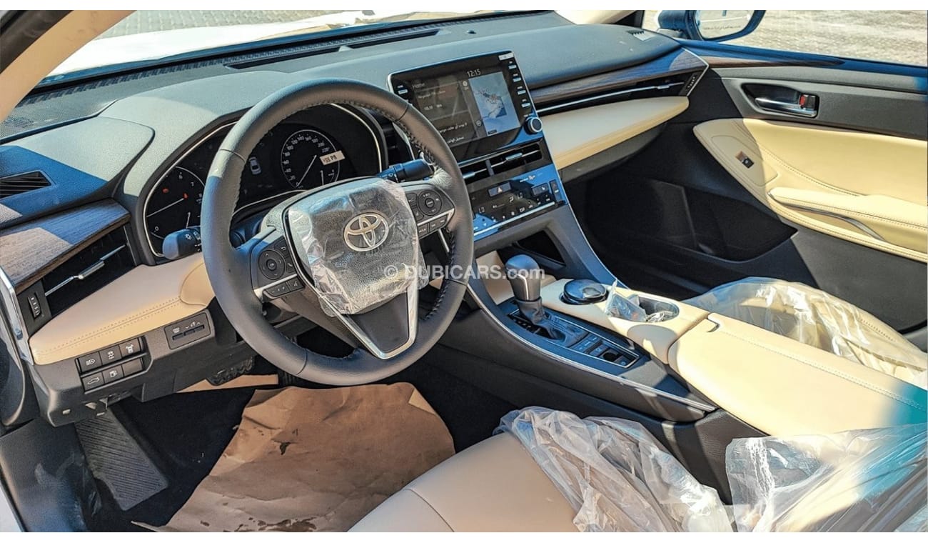 Toyota Avalon XLE Особенности интерьера   ABS+EBD+BA+VSC+TRC+HSA(HiII Start Assist)   Розетка для аксессуаров   По