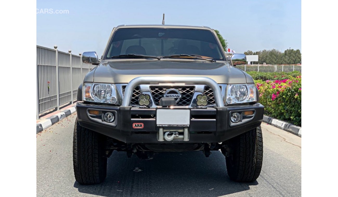 Nissan Patrol Pickup SGL excellent condition - complete agency maintained - upgraded front and rear bumper with ARB winch