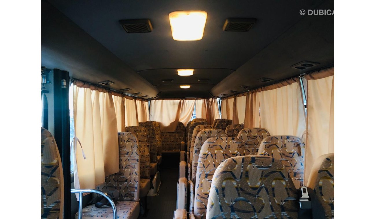 Toyota Coaster 30 Seater - Full Air Condition - Clean interior & exterior - Special price for ANGOLA