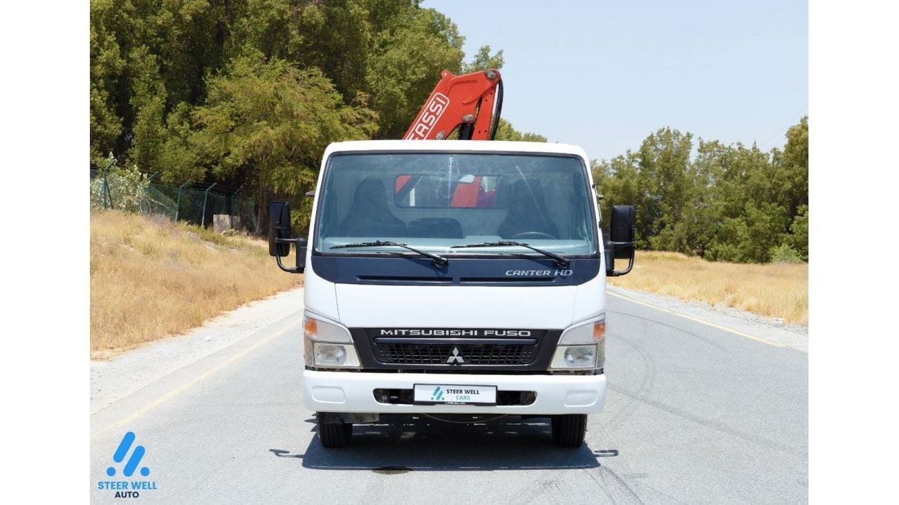 Mitsubishi Fuso Canter HD Fuso - Cargo Body with Fassi Crane - 4.2L RWD - DSL - MT - Book Now!