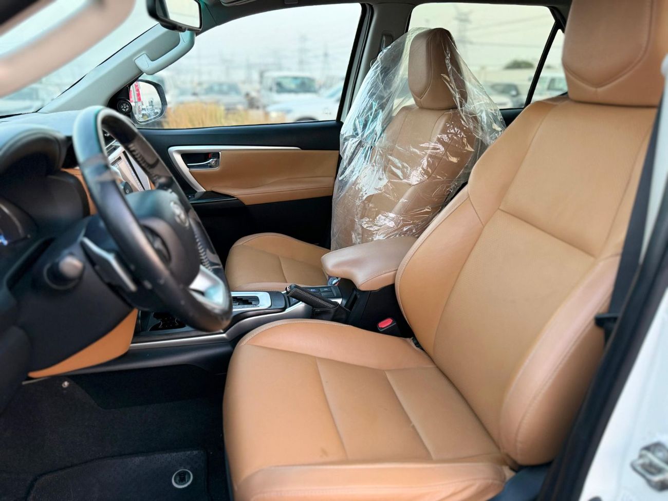 Toyota Fortuner Toyota fortuner 2019 white with orange interior LHD gcc specs 7 seaters