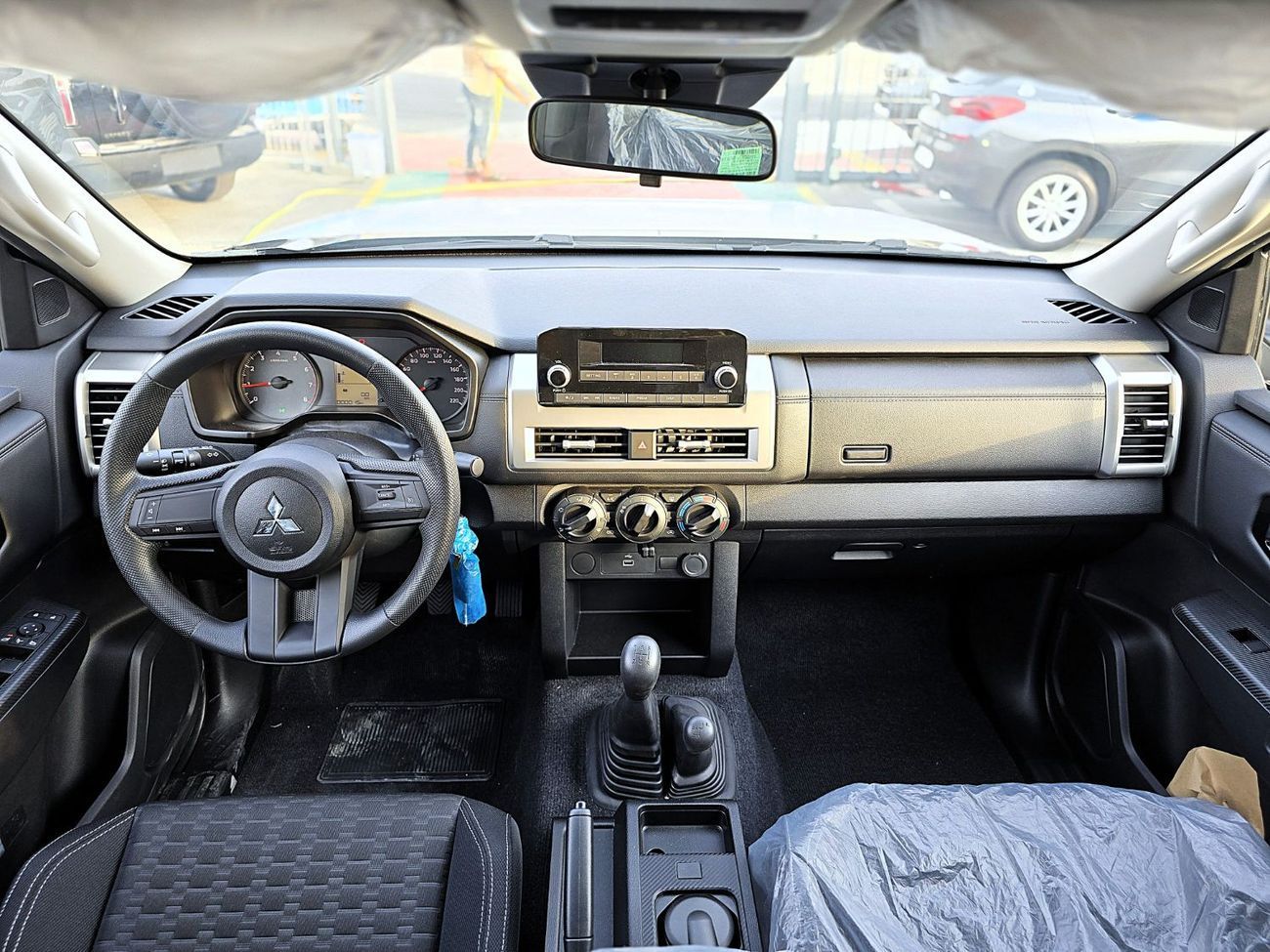 Mitsubishi L200 GL 2.4L (128 HP) Double Cab Utility L200 Pickup 4WD GL Petrol DC 5M/T - 2.4L 2025 Model Brown Color