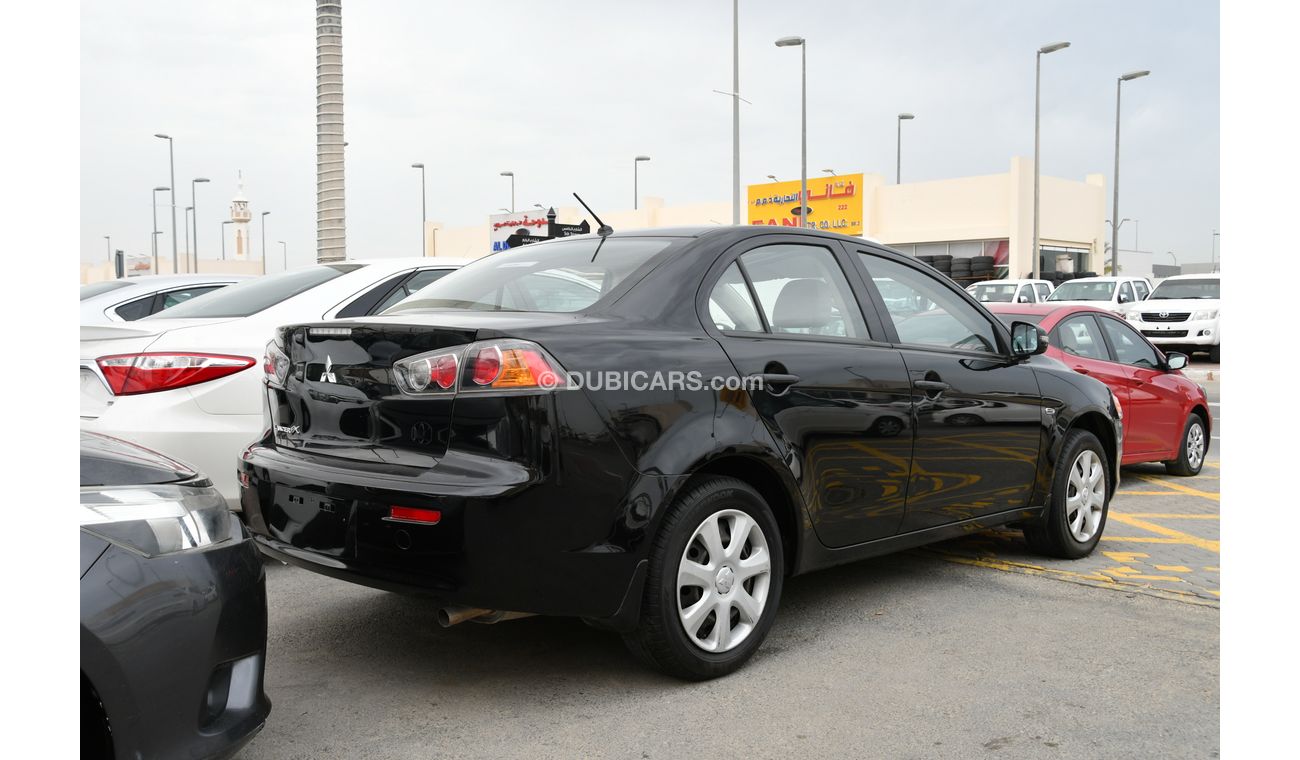 Mitsubishi Lancer 2015 BLACK GCC NO ACCIDENT NO PAINT PERFECT